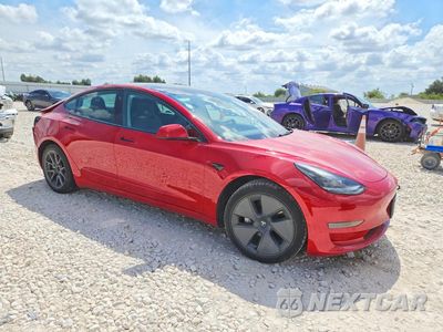 Czwarte zdjęcie samochodu z boku: 2022 TESLA MODEL 3 VIN:5YJ3E1EA1NF191930 - miniatura