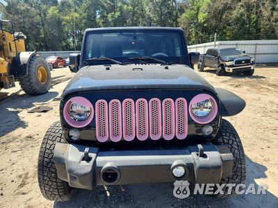 Piąte zdjęcie samochodu w środku: 2015 JEEP WRANGLER UNLIMITED SPORT VIN:1C4BJWDG1FL762468 - miniatura