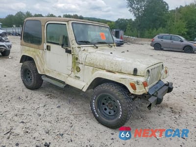 Czwarte zdjęcie samochodu z boku: 2002 JEEP WRANGLER / TJ SAHARA VIN:1J4FA59S32P760002 - miniatura