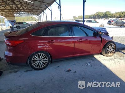 Trzecie zdjęcie samochodu z tyłu: 2016 FORD FOCUS TITANIUM VIN:1FADP3J28GL287763 - miniatura