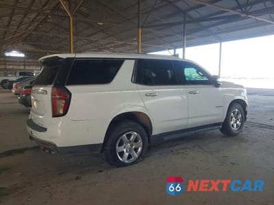 Trzecie zdjęcie samochodu z tyłu: 2022 CHEVROLET TAHOE K1500 PREMIER VIN:1GNSKSKD7NR155041 - miniatura