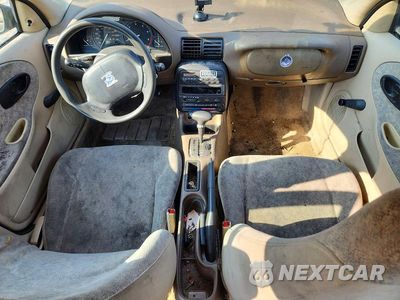 Zdjęcie 8 z 12 samochodu: 1996 SATURN SL1 VIN:1G8ZH528XTZ135187 - miniatura