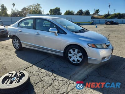 Czwarte zdjęcie samochodu z boku: 2009 HONDA CIVIC LX VIN:19XFA16559E051482 - miniatura