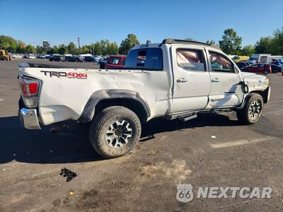Trzecie zdjęcie samochodu z tyłu: 2023 TOYOTA TACOMA TRD OFF-ROAD VIN:3TMDZ5BN1PM145133 - miniatura