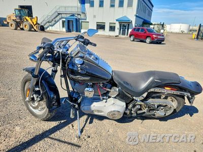 Trzecie zdjęcie samochodu z tyłu: 2004 HARLEY-DAVIDSON FXST VIN:5HD1BHY144Y041384 - miniatura