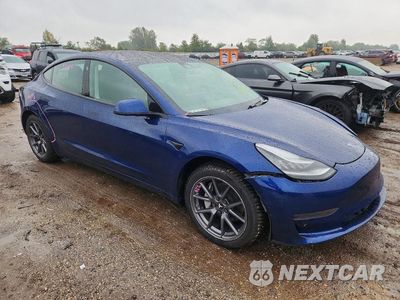 Czwarte zdjęcie samochodu z boku: 2021 TESLA MODEL 3 VIN:5YJ3E1EA2MF853593 - miniatura