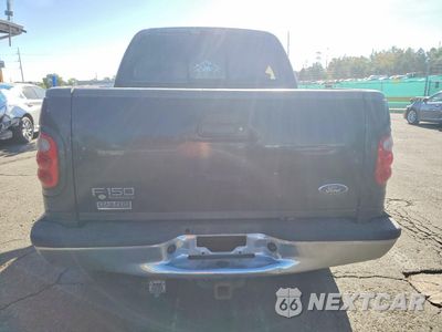 Zdjęcie 6 z 12 samochodu: 2001 FORD F150 SUPERCREW VIN:1FTRW08L61KA55692 - miniatura