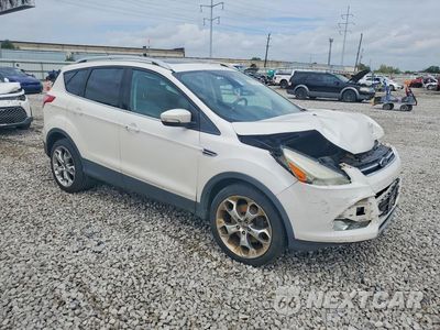 Czwarte zdjęcie samochodu z boku: 2014 FORD ESCAPE TITANIUM VIN:1FMCU9J93EUA11542 - miniatura