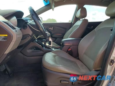 Zdjęcie 7 z 13 samochodu: 2015 HYUNDAI TUCSON SE VIN:KM8JUCAG4FU031058 - miniatura