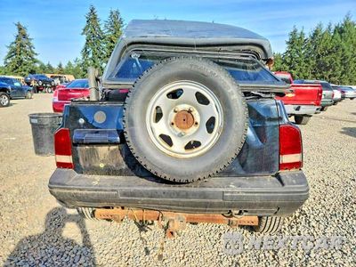 Zdjęcie 6 z 13 samochodu: 1993 GEO TRACKER VIN:2CNBJ18UXP6935073 - miniatura