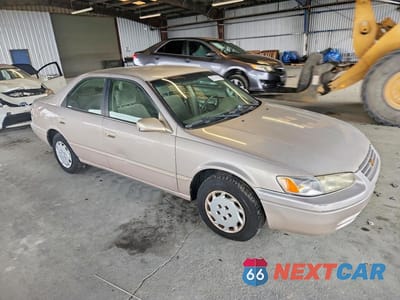 Czwarte zdjęcie samochodu z boku: 1997 TOYOTA CAMRY LE VIN:4T1BG22K7VU781657 - miniatura