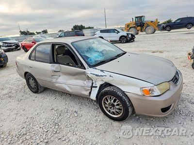 Czwarte zdjęcie samochodu z boku: 2002 TOYOTA COROLLA LE VIN:1NXBR12E42Z574329 - miniatura