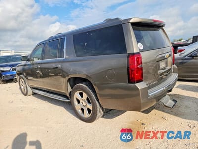 Drugie zdjęcie samochodu z przodu: 2016 CHEVROLET SUBURBAN C1500 LTZ VIN:1GNSCJKC1GR392576 - miniatura