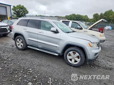 Czwarte zdjęcie samochodu z boku: 2013 JEEP GRAND CHEROKEE LAREDO VIN:1C4RJFAG5DC640342 - miniatura