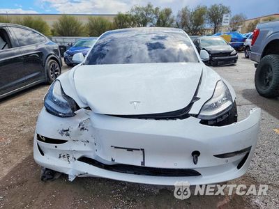 Piąte zdjęcie samochodu w środku: 2018 TESLA MODEL 3 VIN:5YJ3E1EA7JF060432 - miniatura