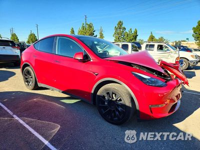 Czwarte zdjęcie samochodu z boku: 2023 TESLA MODEL Y VIN:7SAYGDEE9PF881712 - miniatura