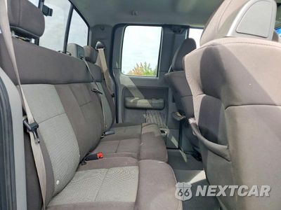 Zdjęcie 10 z 12 samochodu: 2005 FORD F150 VIN:1FTPX14555NA90021 - miniatura