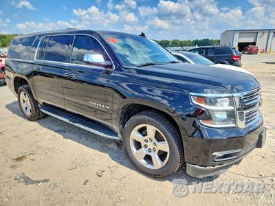 Czwarte zdjęcie samochodu z boku: 2016 CHEVROLET SUBURBAN C1500 LTZ VIN:1GNSCJKC0GR216828 - miniatura
