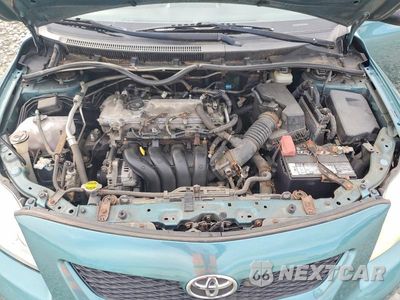 Zdjęcie 11 z 12 samochodu: 2009 TOYOTA COROLLA BASE VIN:JTDBL40E699055841 - miniatura