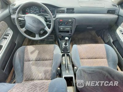 Zdjęcie 8 z 13 samochodu: 1999 NISSAN SENTRA XE VIN:3N1AB41D8XL096435 - miniatura