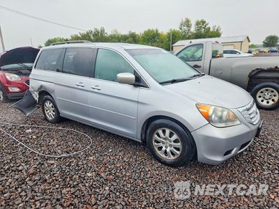 Czwarte zdjęcie samochodu z boku: 2010 HONDA ODYSSEY EXL VIN:5FNRL3H67AB080120 - miniatura