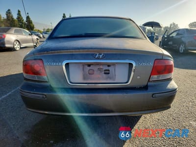 Zdjęcie 6 z 12 samochodu: 2003 HYUNDAI SONATA BASE VIN:KMHWF25SX3A787788 - miniatura