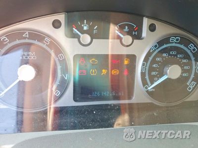 Zdjęcie 9 z 13 samochodu: 2010 MERCURY MARINER PREMIER VIN:4M2CN8H70AKJ06060 - miniatura