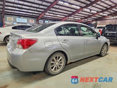 Trzecie zdjęcie samochodu z tyłu: 2012 SUBARU IMPREZA PREMIUM VIN:JF1GJAC62CH012003 - miniatura