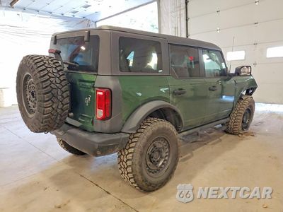 Trzecie zdjęcie samochodu z tyłu: 2022 FORD BRONCO BASE VIN:1FMDE5BHXNLB63355 - miniatura