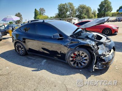 Czwarte zdjęcie samochodu z boku: 2020 TESLA MODEL Y VIN:5YJYGDEF7LF049673 - miniatura