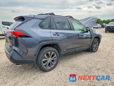 Trzecie zdjęcie samochodu z tyłu: 2023 TOYOTA RAV4 XLE PREMIUM VIN:JTMB6RFV7PD106348 - miniatura