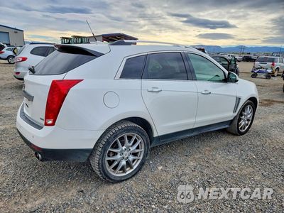 Trzecie zdjęcie samochodu z tyłu: 2014 CADILLAC SRX PERFORMANCE COLLECTION VIN:3GYFNFE32ES572831 - miniatura