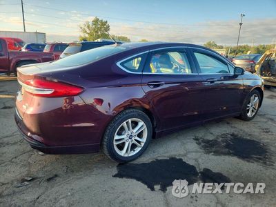 Trzecie zdjęcie samochodu z tyłu: 2018 FORD FUSION SE VIN:3FA6P0HD1JR211082 - miniatura