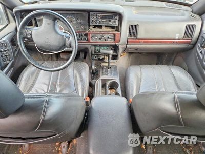 Zdjęcie 8 z 14 samochodu: 1997 JEEP GRAND CHEROKEE LAREDO VIN:1J4GZ58Y7VC711433 - miniatura