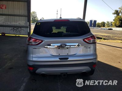 Zdjęcie 6 z 13 samochodu: 2016 FORD ESCAPE TITANIUM VIN:1FMCU9J90GUB39272 - miniatura