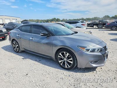 Czwarte zdjęcie samochodu z boku: 2016 NISSAN MAXIMA 3.5 SL VIN:1N4AA6AP6GC377351 - miniatura