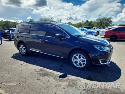 Czwarte zdjęcie samochodu z boku: 2017 CHRYSLER PACIFICA TOURING L VIN:2C4RC1BG3HR823392 - miniatura
