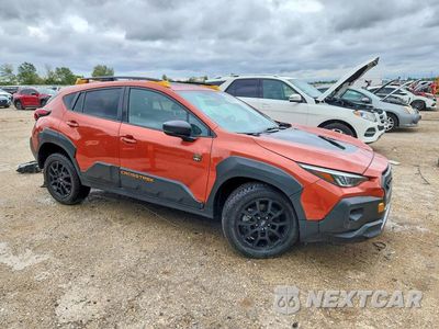 Czwarte zdjęcie samochodu z boku: 2024 SUBARU CROSSTREK WILDERNESS VIN:4S4GUHU69R3811495 - miniatura