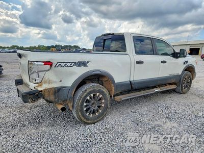 Trzecie zdjęcie samochodu z tyłu: 2016 NISSAN TITAN XD PRO-4X VIN:1N6BA1F41GN512673 - miniatura