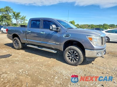 Czwarte zdjęcie samochodu z boku: 2017 NISSAN TITAN XD SV VIN:1N6BA1F32HN563236 - miniatura