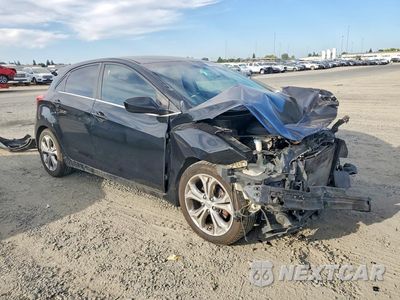 Czwarte zdjęcie samochodu z boku: 2013 HYUNDAI ELANTRA GT BASE VIN:KMHD35LE9DU042383 - miniatura