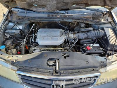 Zdjęcie 12 z 13 samochodu: 2002 HONDA ODYSSEY LX VIN:5FNRL18522B032456 - miniatura