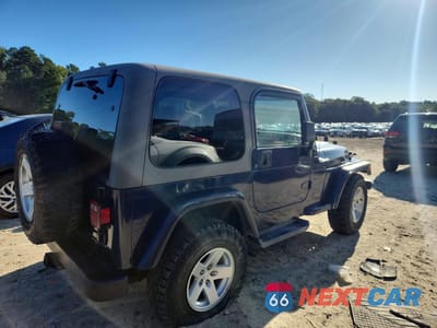 Trzecie zdjęcie samochodu z tyłu: 1997 JEEP WRANGLER / TJ SPORT VIN:1J4FY19SXVP489075 - miniatura