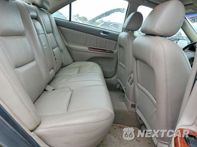Zdjęcie 10 z 12 samochodu: 2003 TOYOTA CAMRY XLE VIN:4T1BE30K53U767638 - miniatura