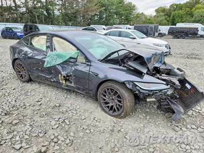 Czwarte zdjęcie samochodu z boku: 2024 TESLA MODEL 3 VIN:5YJ3E1EA1RF773337 - miniatura