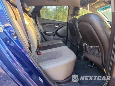 Zdjęcie 11 z 14 samochodu: 2013 HYUNDAI TUCSON GLS VIN:KM8JUCAC1DU561045 - miniatura