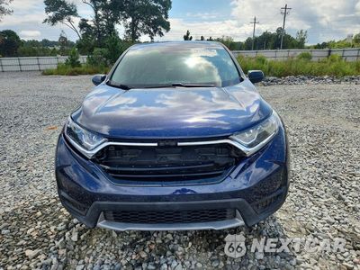 Piąte zdjęcie samochodu w środku: 2019 HONDA CR-V LX VIN:2HKRW5H35KH403060 - miniatura