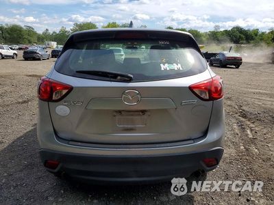 Zdjęcie 6 z 14 samochodu: 2014 MAZDA CX-5 SPORT VIN:JM3KE2BEXE0423200 - miniatura