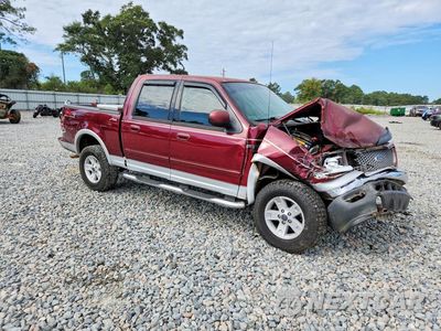 Czwarte zdjęcie samochodu z boku: 2003 FORD F150 SUPERCREW VIN:1FTRW08L13KA63783 - miniatura