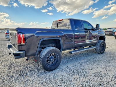Trzecie zdjęcie samochodu z tyłu: 2016 GMC SIERRA K1500 SLT VIN:1GTV2NEC6GZ144934 - miniatura